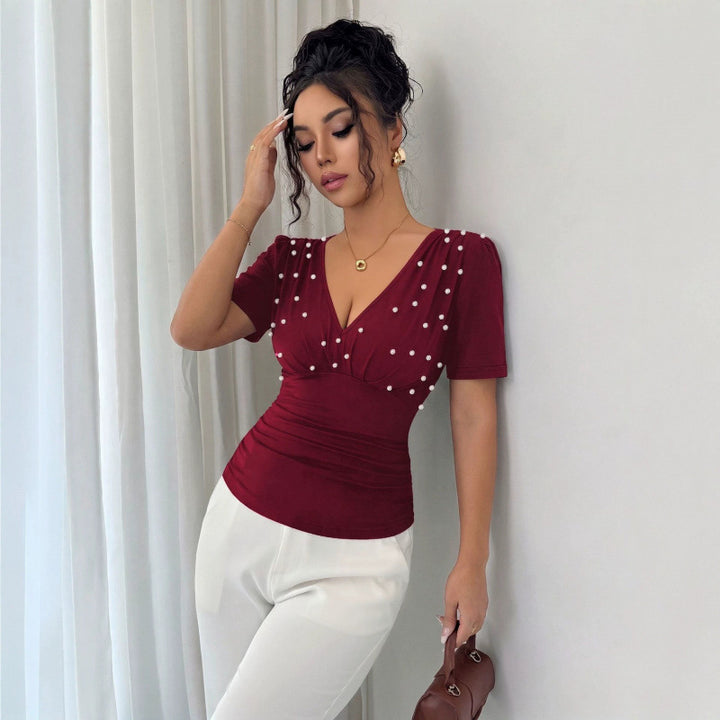 Dame elegant bluse med perle-detalj Skjora