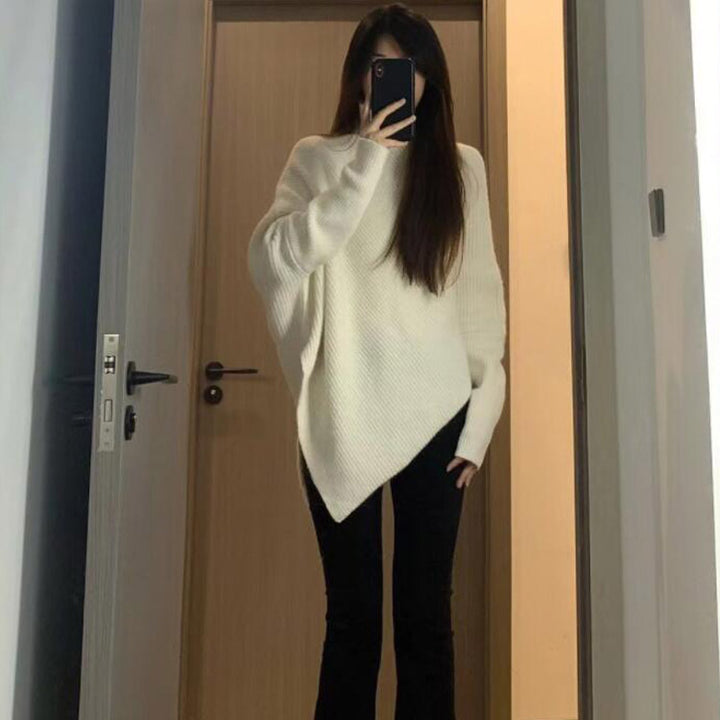 Kvinnes oversized strikket genser med asymmetrisk kutt og fin ribbestruktur Skjora