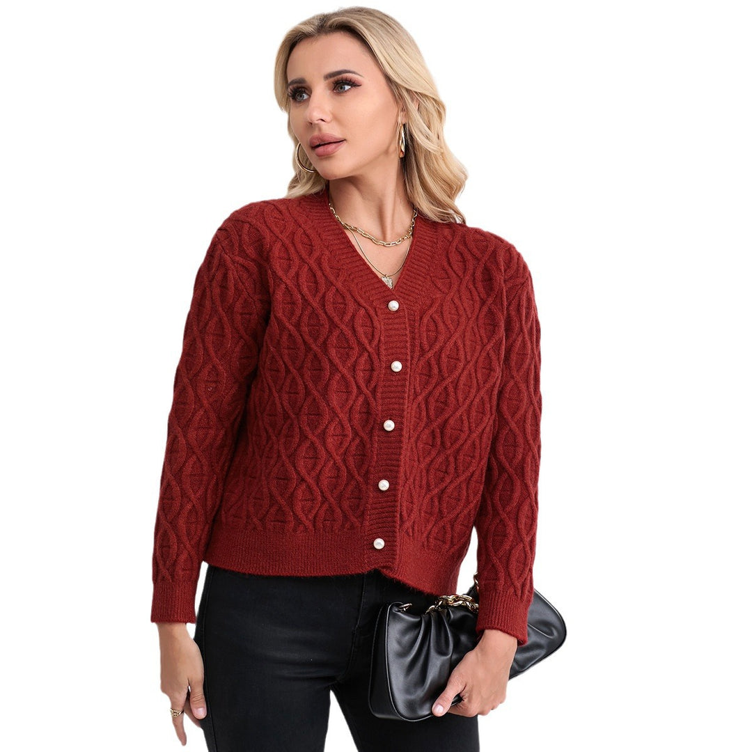 Women's designer cardigan with cable pattern and soft colors Skjora