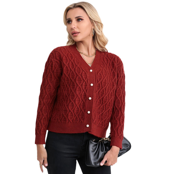 Women's designer cardigan with cable pattern and soft colors Skjora