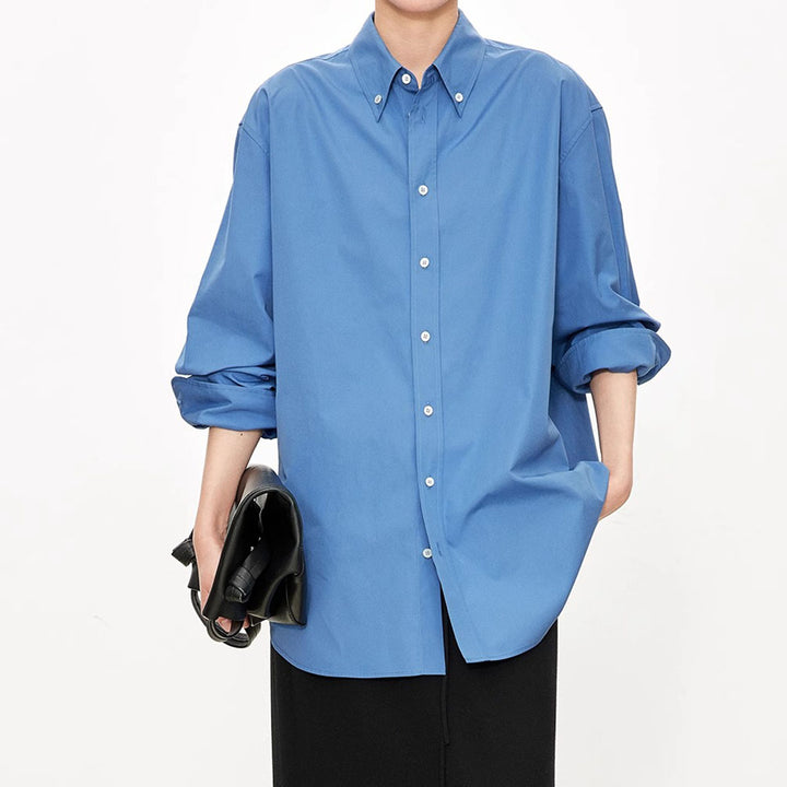 Damer elegant oversized bluse med klassiske knappedetaljer Skjora