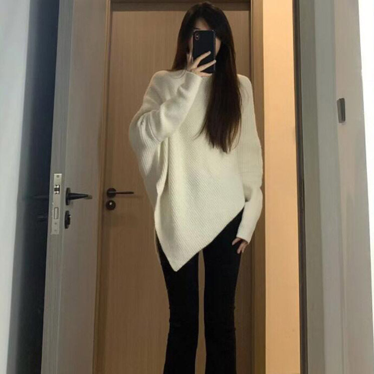 Kvinnes oversized strikket genser med asymmetrisk kutt og fin ribbestruktur Skjora