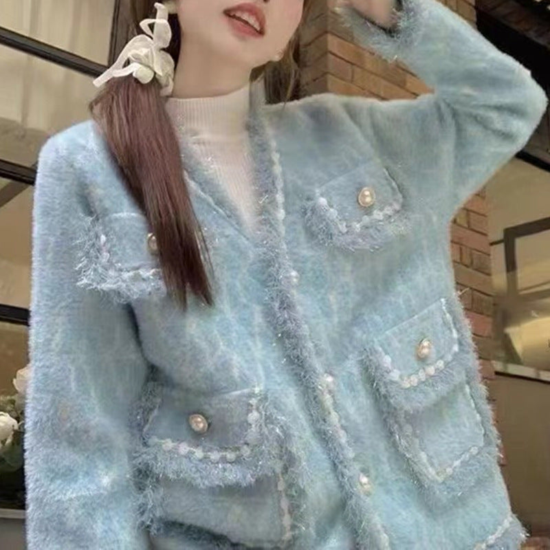 Kvinne Fluffy Cardigan med elegante knappdetaljer og dekorativ kant Skjora