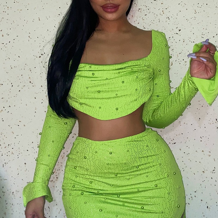 Dame Elegant Crop-Topp med lange, transparente ermer og glitrende akenter Skjora