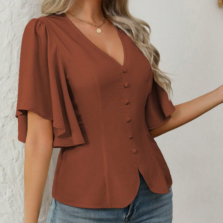 Dame elegant bluse med klokkeermer og knappdetalj Skjora
