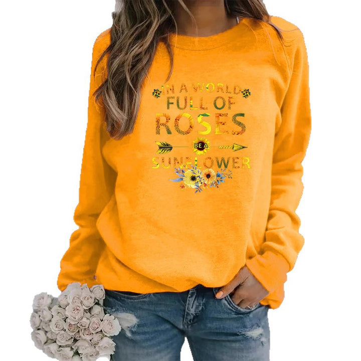 Dame sweatshirt med inspirerende design og blomsterdekorasjon Skjora