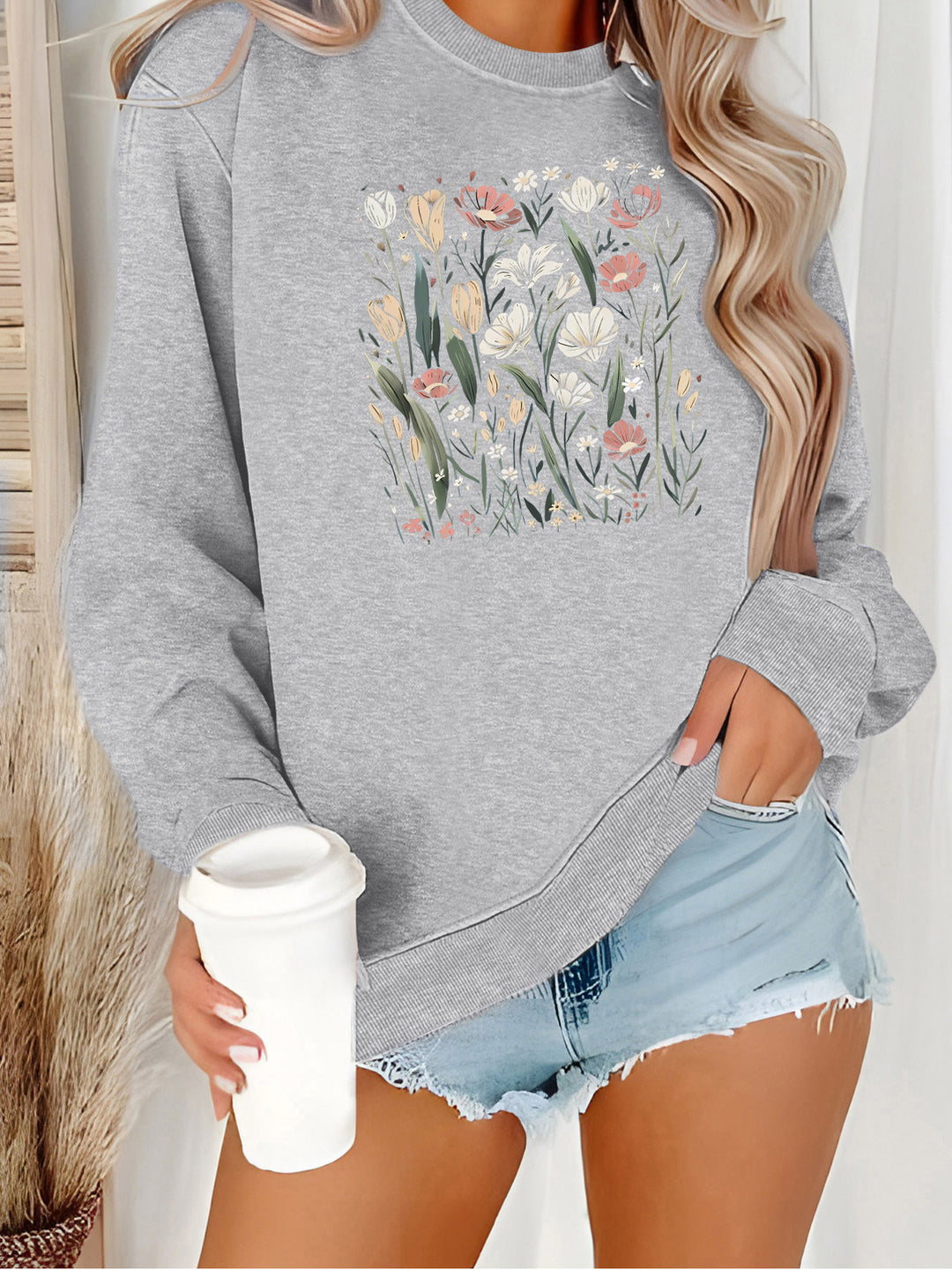 Kvinne genser med blomstermotiv og avslappet passform Skjora