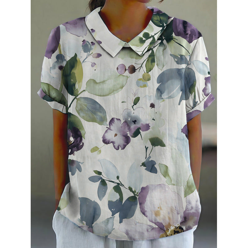 Dame kortermet bluse med florale accenter og klassisk krage Skjora