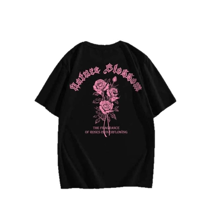 Dame T-skjorte med blomsterdesign og kreativ tekst Skjora