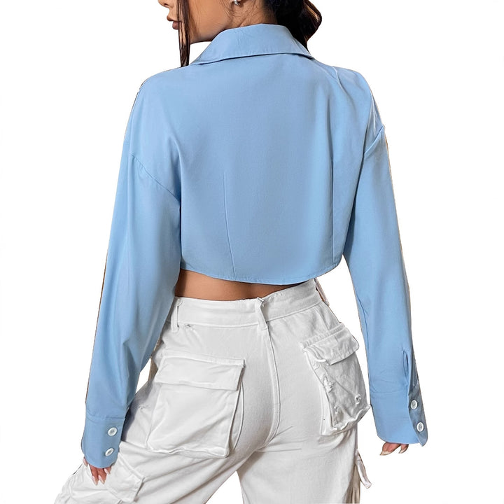 Dame cropped bluse med vide ermer og elegant knappestolpe Skjora