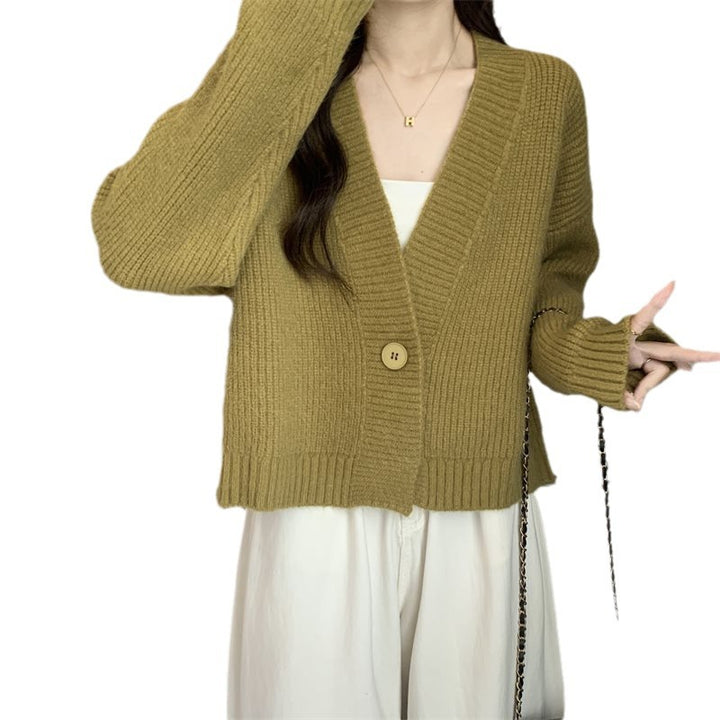 Kvinnenes løse cardigan med V-hals og store knapper Skjora