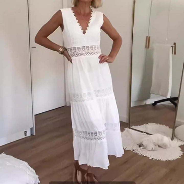 Kvinnens elegante maxikjole med blonder og lav ryggdel