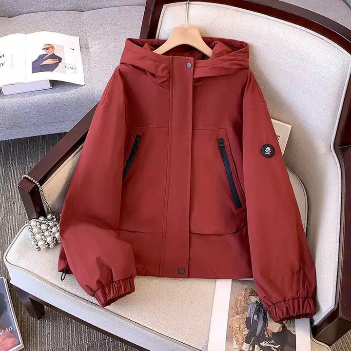 Dame sporty overgangsjakke med praktisk hette design Skjora