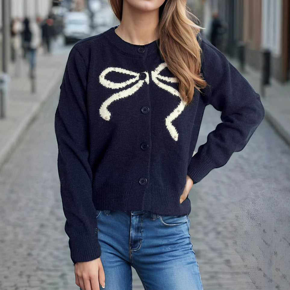 Kvinners koselige cardigan med bue-motiv Skjora