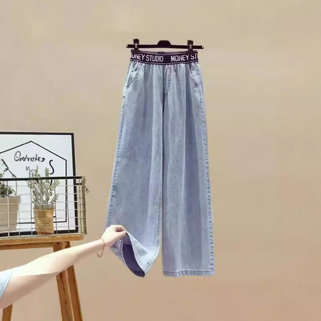 Dame To-delt Sett med løstsittende, stripete topp og vide jeans-bukser Skjora