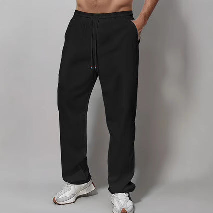 Herre Sporty Avslappet Passform Joggebukser med Elastisk Liv og Sidelommer Skjora