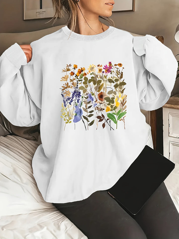 Dame sweatshirt med blomsterdesign og komfortabel passform Skjora