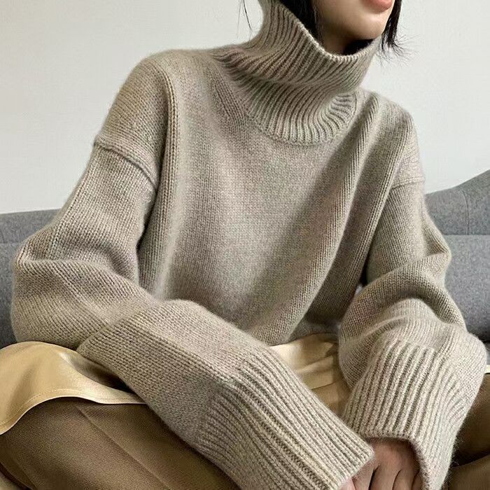Dame moter turtleneck genser med vide ermer og ribbet struktur Skjora