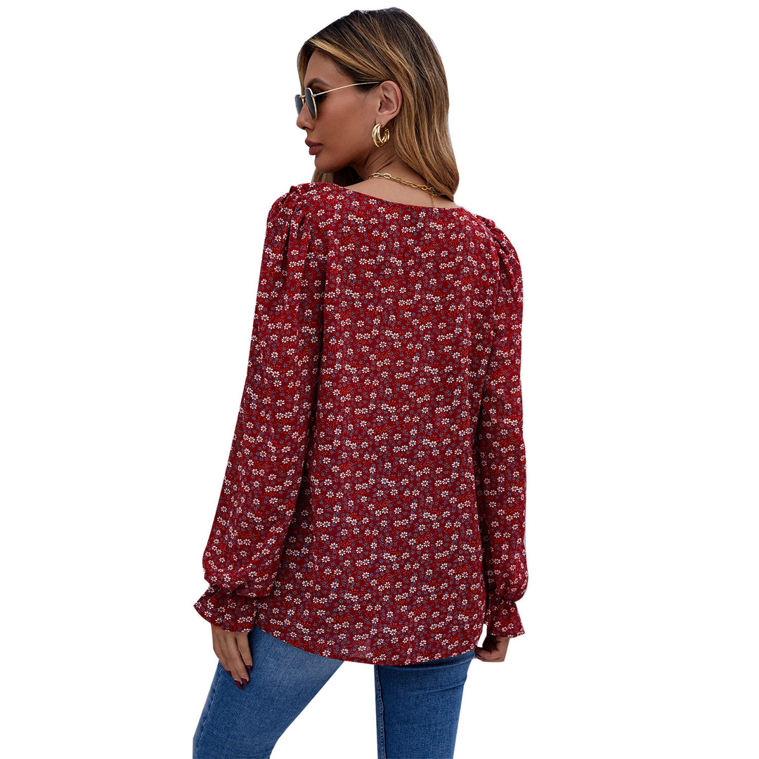 Damebluse med ruffledetaljer og blomstermønster Skjora