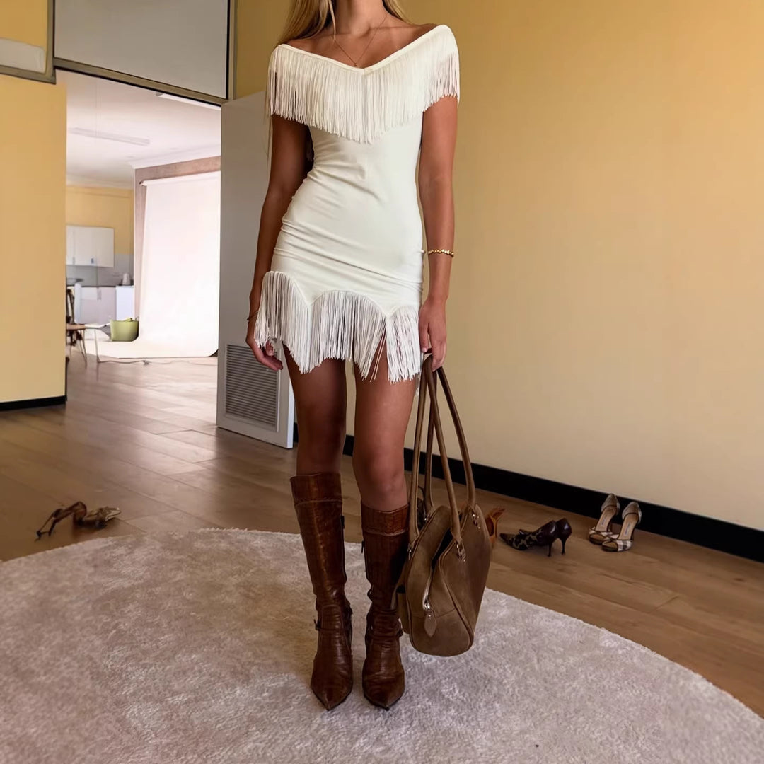 Dame Top med frynsete detalj og off-shoulder-design Skjora