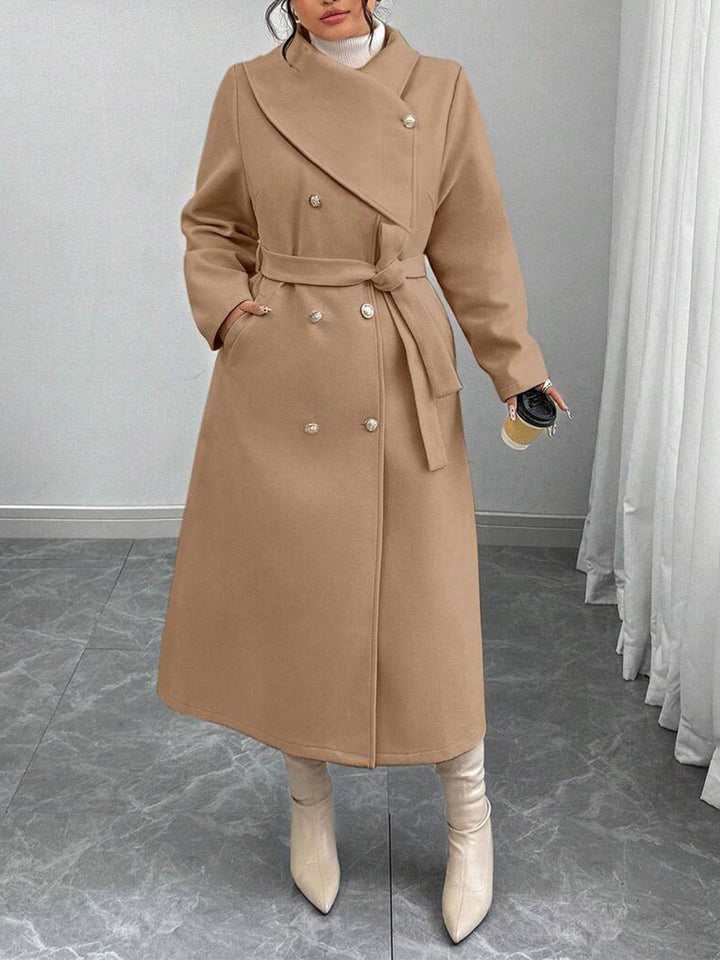 Kvinnens elegante varme ullkåpe med dobbel knappestolpe og belte Skjora