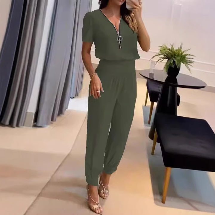 Damer Løs jumpsuit med elegant V-hals og perfekt passform Skjora