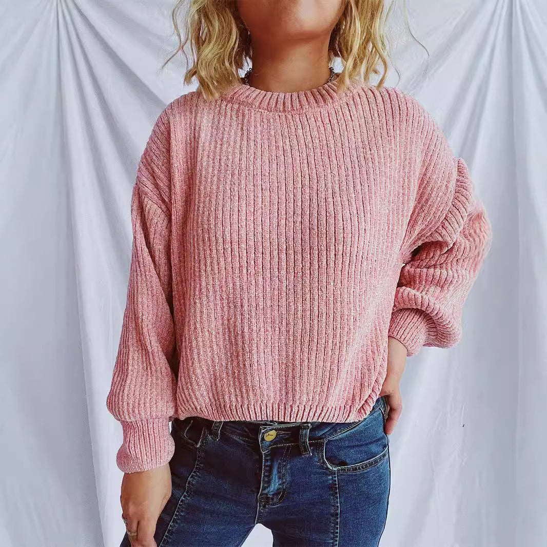 Kvinnens koselige chunky strikkegenser med brede ermer og teksturert design Skjora