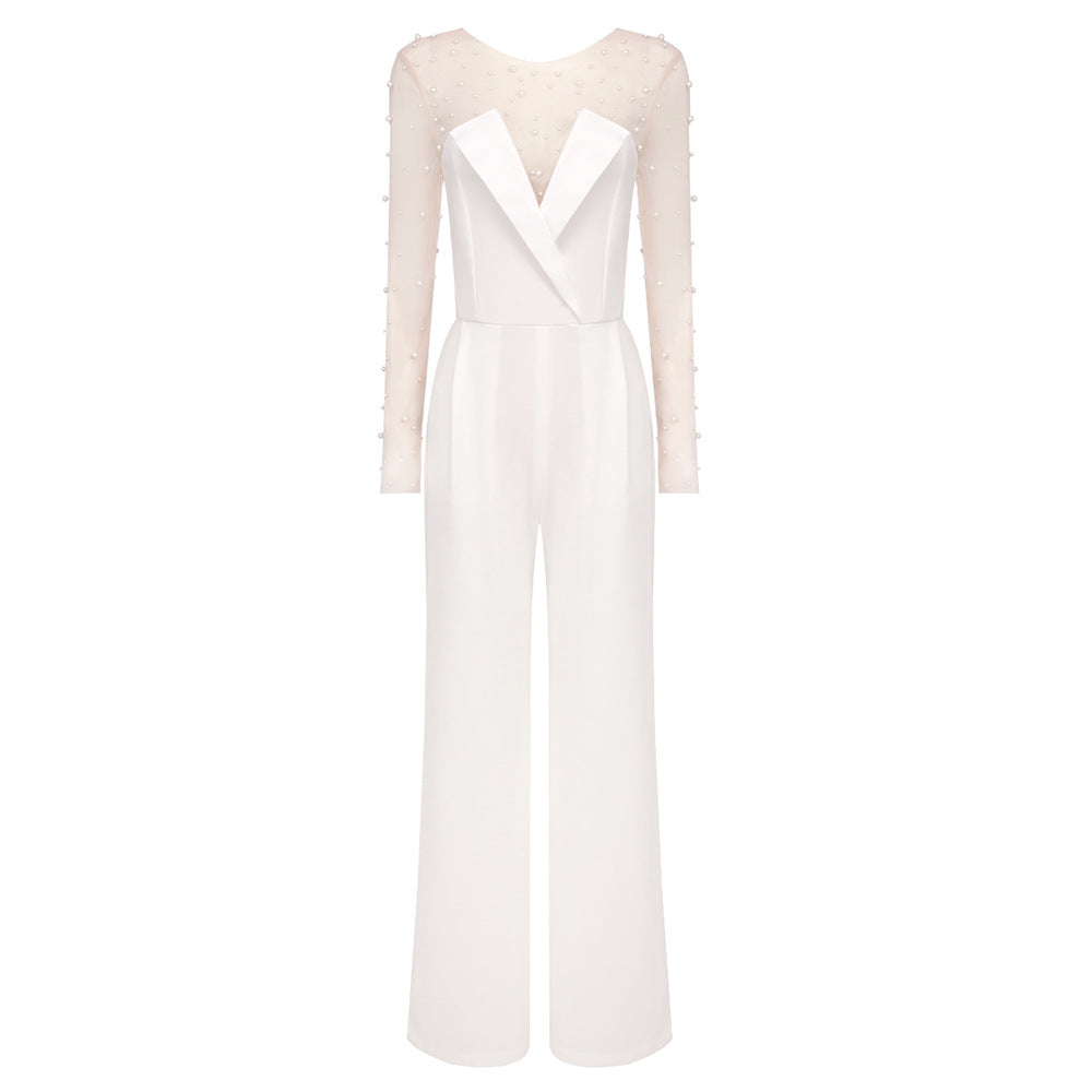 Damer elegant jumpsuit med transparente ermer og perlepynt Skjora