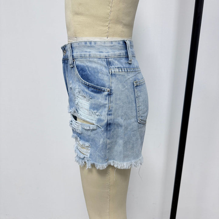 Damer ødelagte denimshorts i avslappet stil Skjora