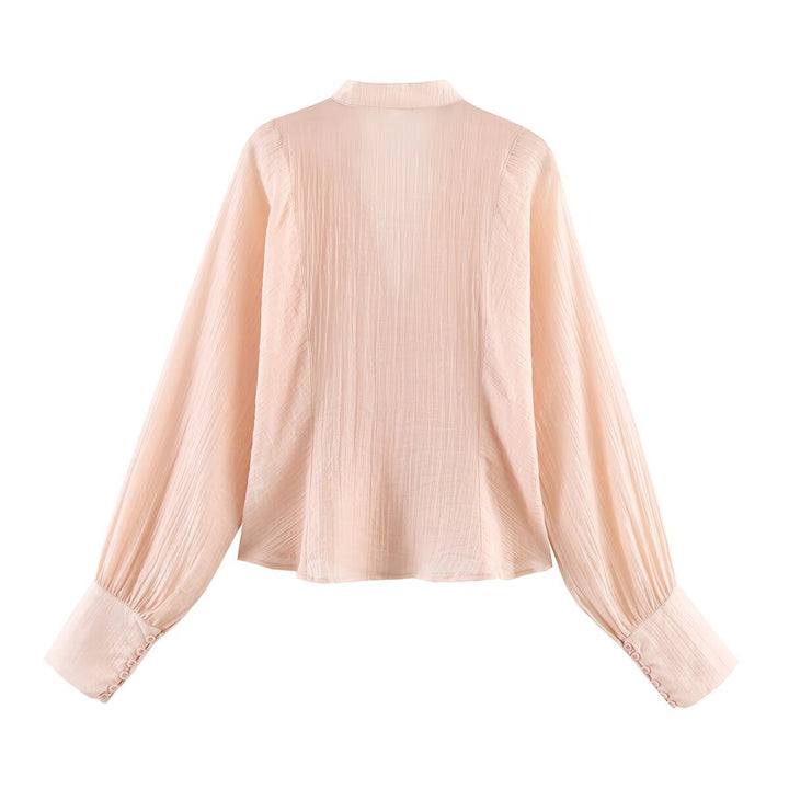 Damer elegant bluse med dyp V-hals og strukturerte ermer Skjora
