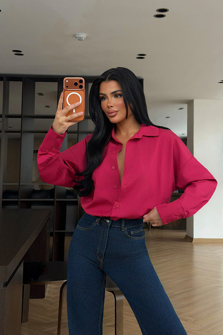 Damer elegant bluse med oversized snitt og knappbar design Skjora