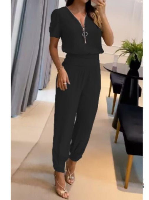 Damer Løs jumpsuit med elegant V-hals og perfekt passform Skjora