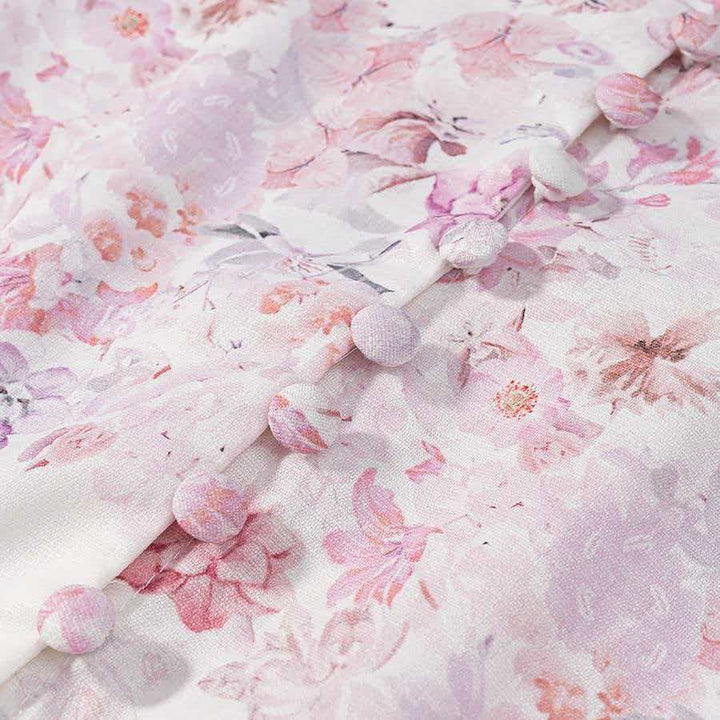 Kjolebluse for kvinner med blomstermønster og belte i midjen Skjora