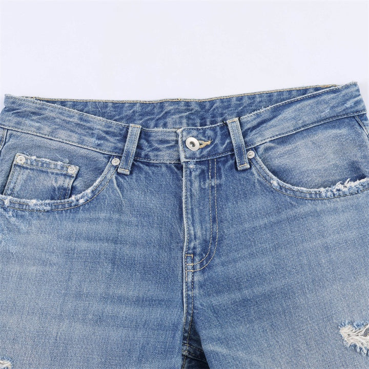 Dame Flared Jeans i brukt look med frynser og ødelagte detaljer Skjora