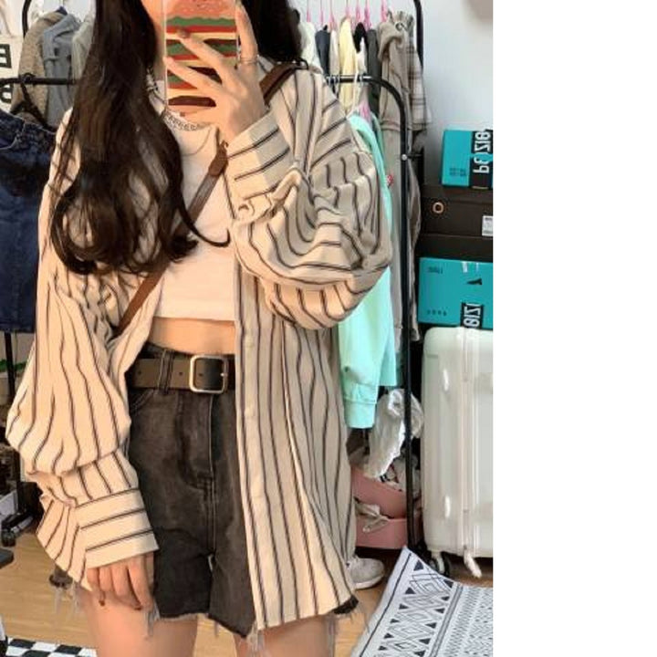 Dame stripete overskjorte bluse i en avslappet fasong med oversized ermer