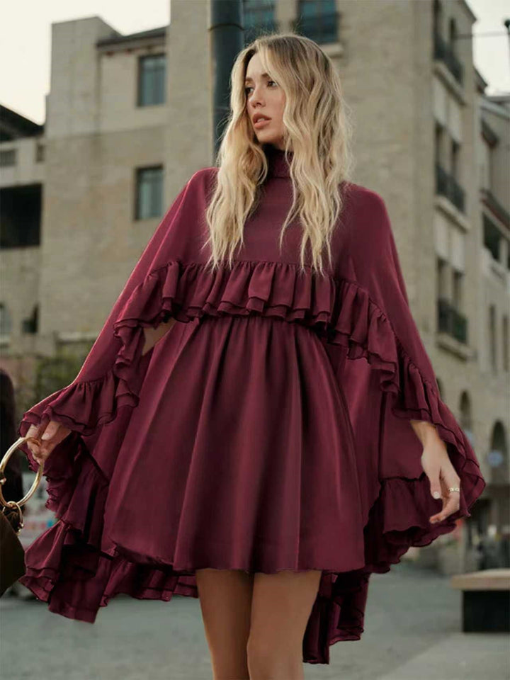 Dame Elegant rynkedress med høy hals og flytende snitt Skjora
