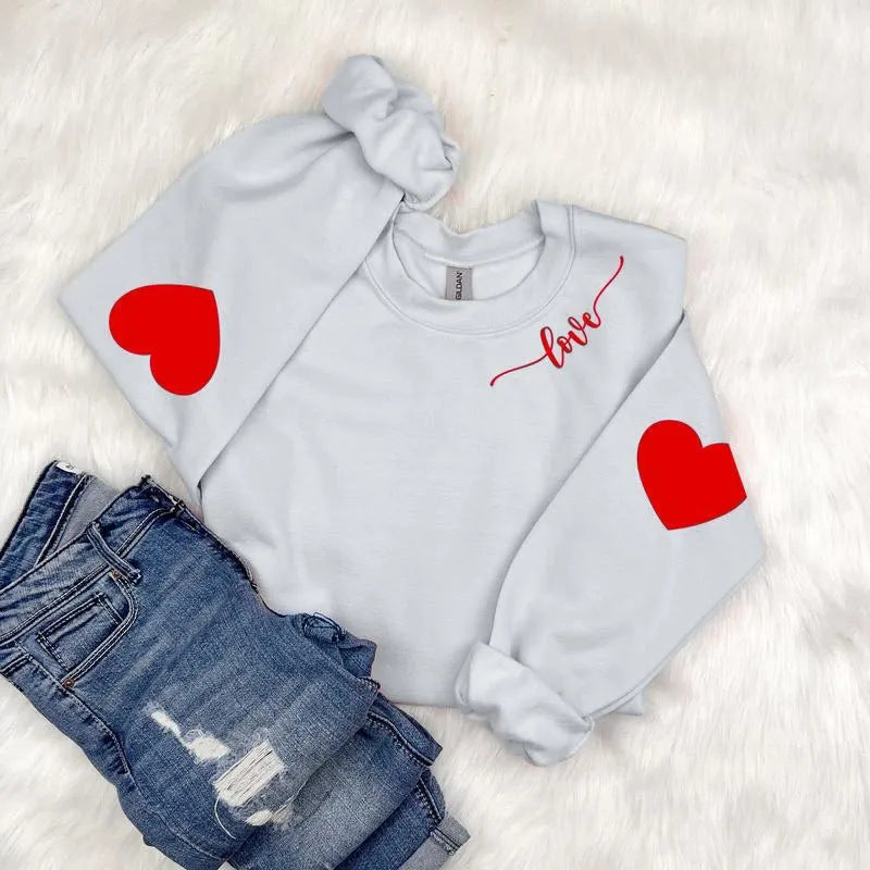 Dame sweatshirt med hjerte design og avslappet passform Skjora