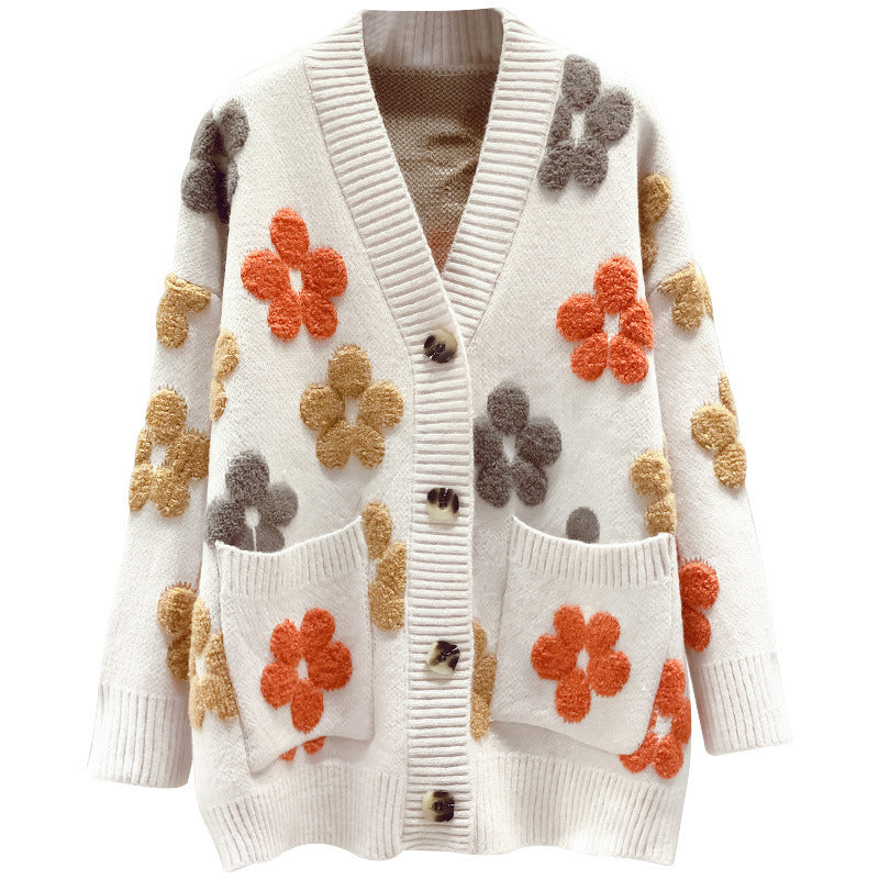 Kvinnens koselige cardigan med blomsterdesign og åpen front Skjora