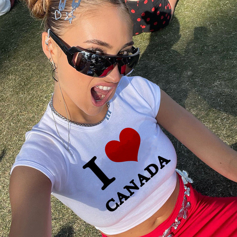 Dame cropped T-shirt med kreativt trykk og komfortabel rund halsutskjæring Skjora