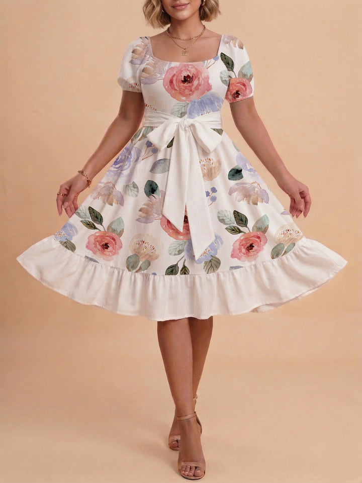 Damen Sommerliches Blumenkleid mit taillierbarem Gürtel und voluminösen Ärmeln Skjora