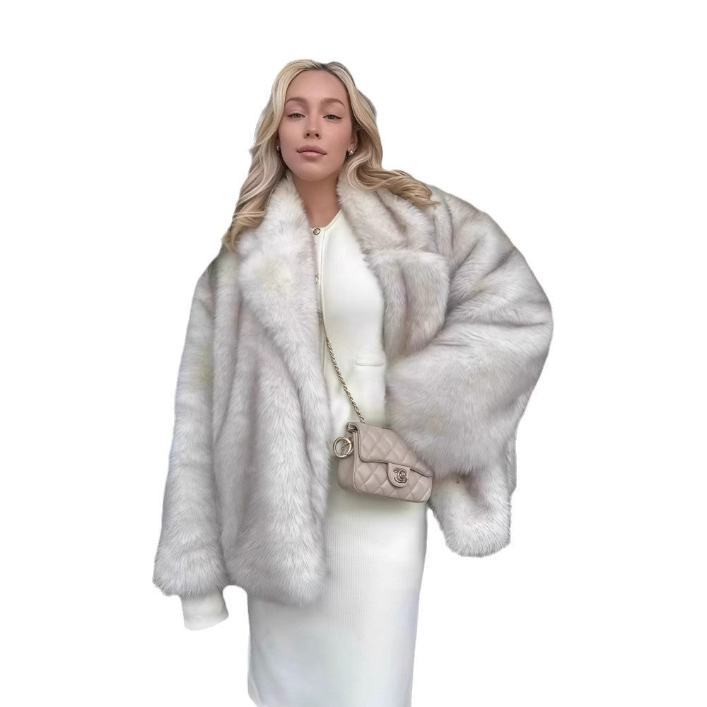 Dame fleece pelsjakke med glitrende detaljer og voluminøs snitt