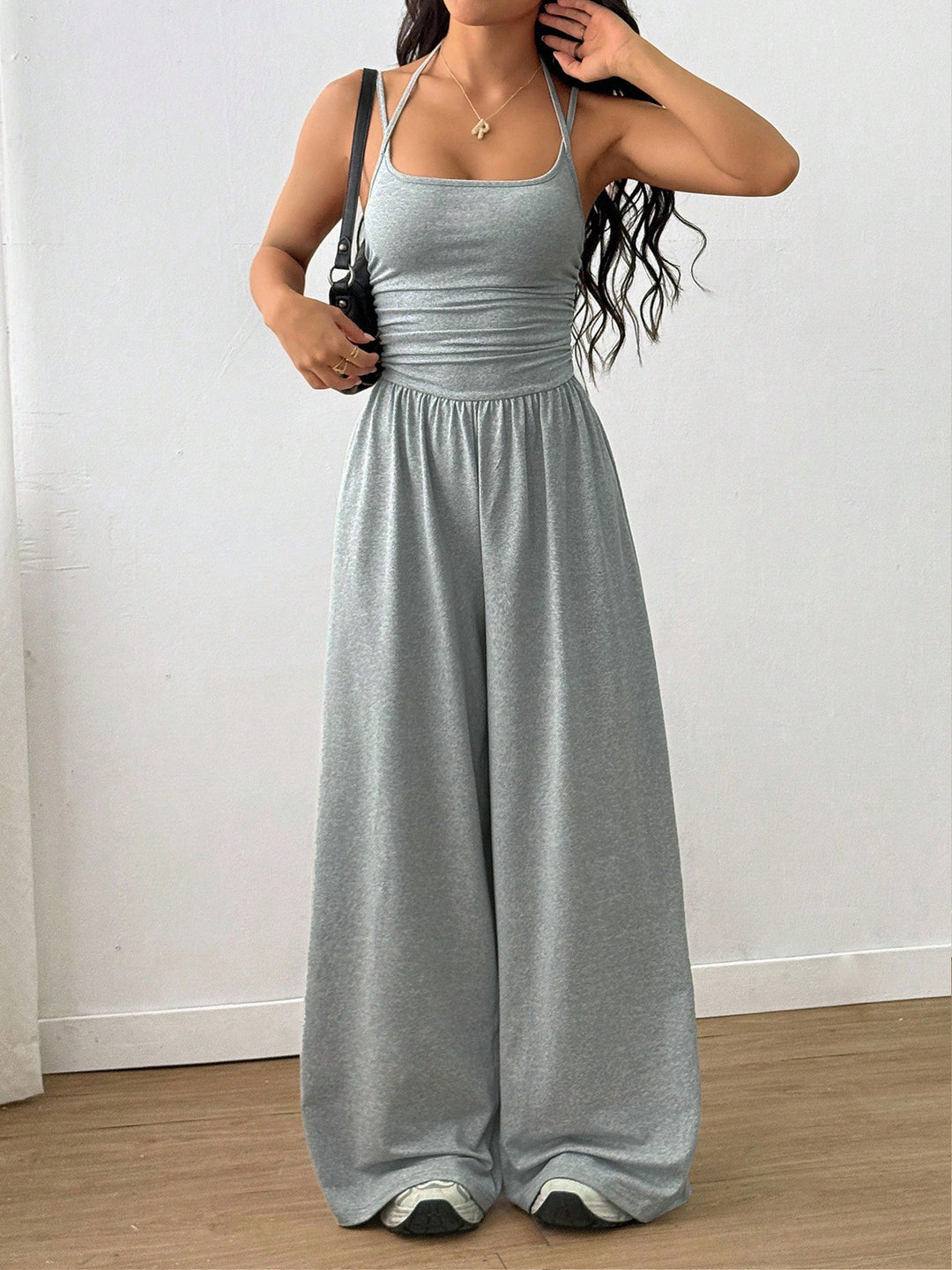 Dame luftig jumpsuit med høy midje og justerbare stropper Skjora