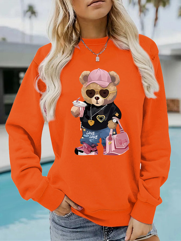 Kvinnegenser med unikt tegneserie-bjørn design og trendy tekst Skjora