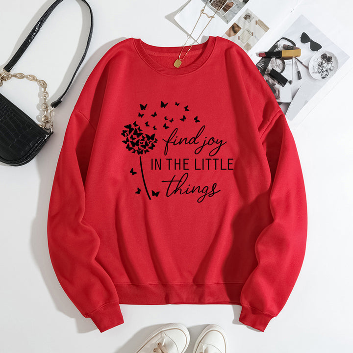 Kvinnegenser med motiverende slogan og blomsterprint Skjora