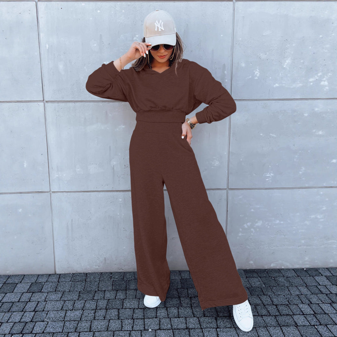 Kvinne casual jumpsuit med vide ben og praktisk hette Skjora