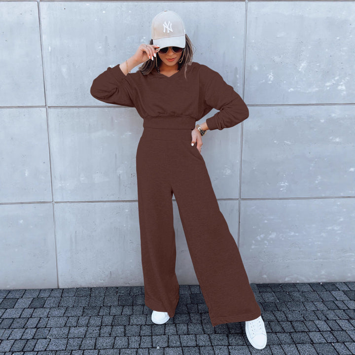 Kvinne casual jumpsuit med vide ben og praktisk hette Skjora