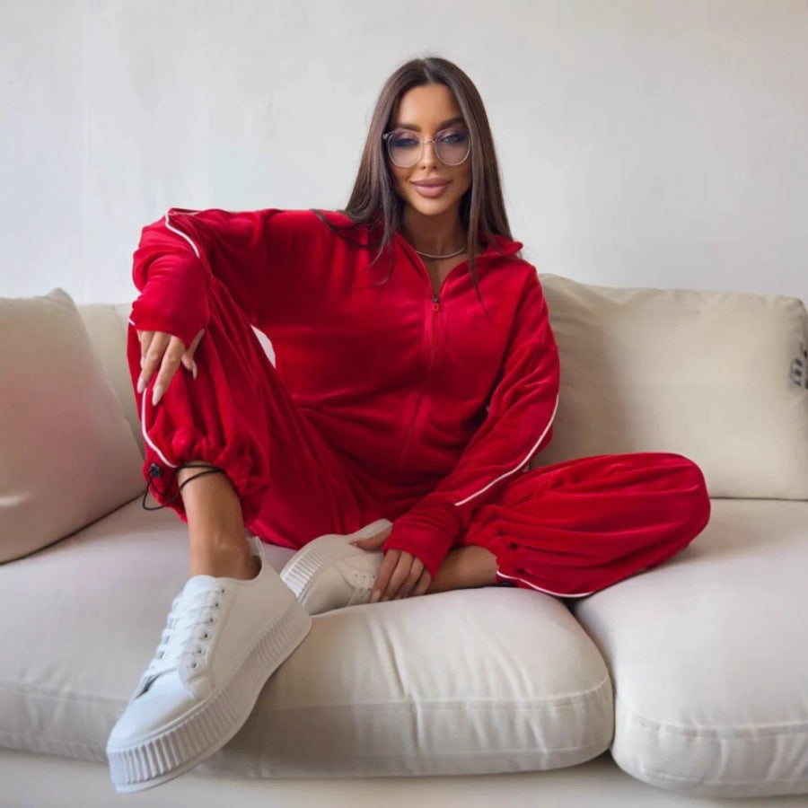 Kvinne elegant fleece treningsdrakt med praktiske lommer og elastiske mansjetter