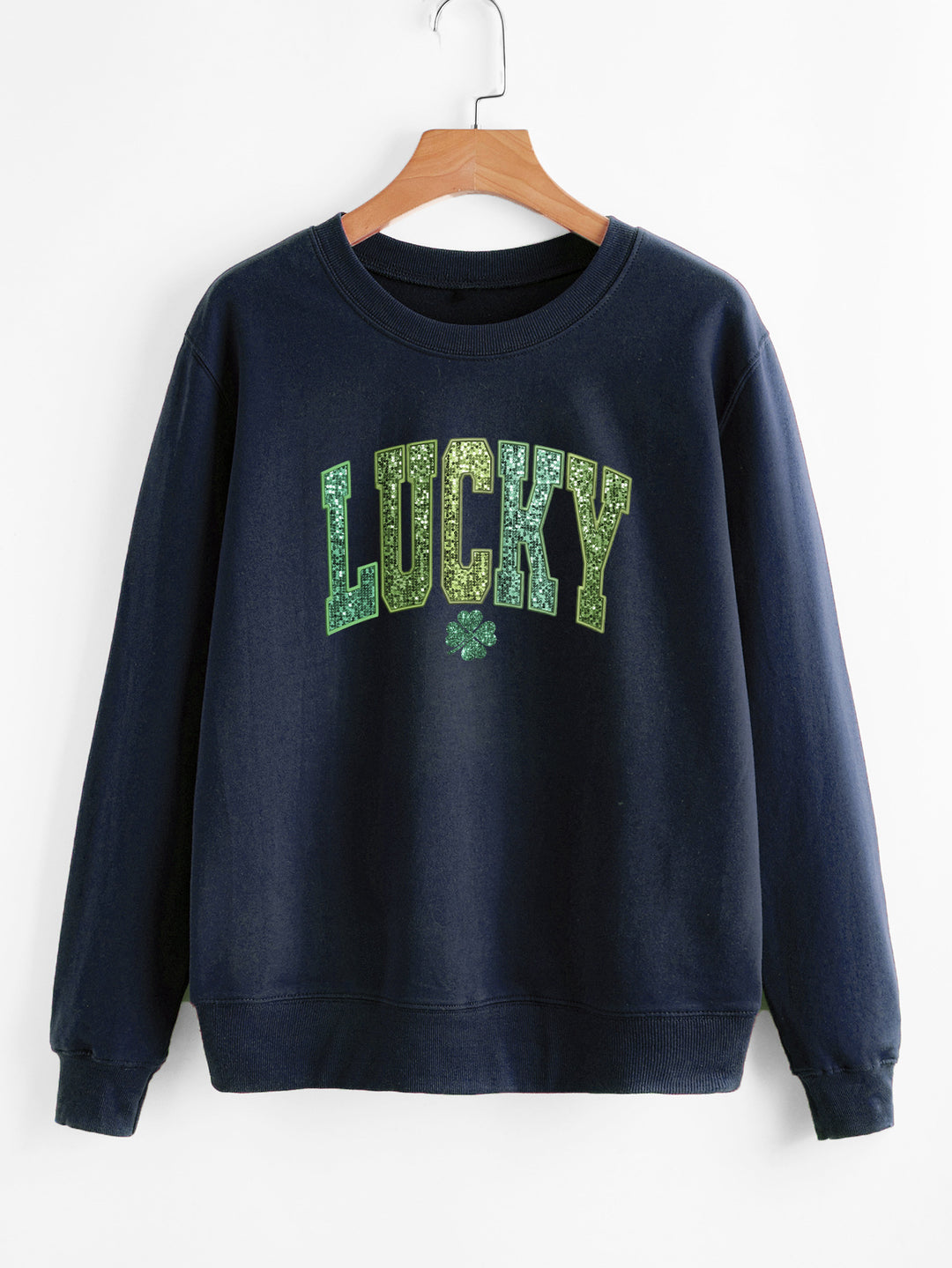 Dame uformell sweatshirt med glitrende skrift og firkløvermotiv Skjora