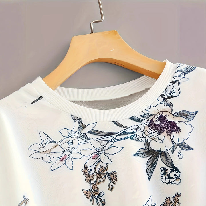 Dame sweatshirt med blomstermønster og avslappet passform Skjora