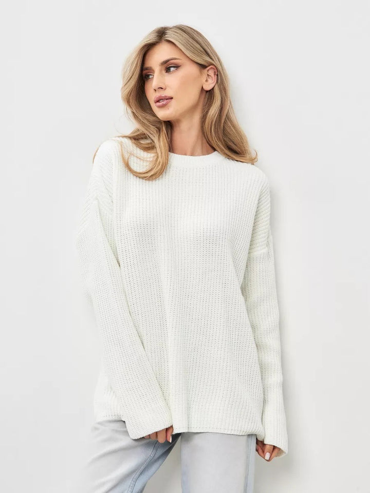 Dame casual oversized strikkegenser med åpne ermekanter og lett ribbestrikket mønster Skjora